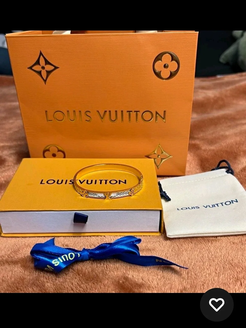 Louis Vuitton Gold Bracelet with Blue Ribbon Accent
